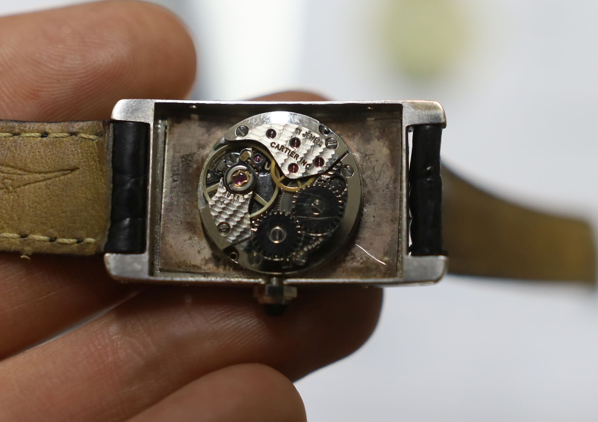 A 1920's 18ct white gold Cartier Tank Cintree (7 lignes model) manual wind wrist watch